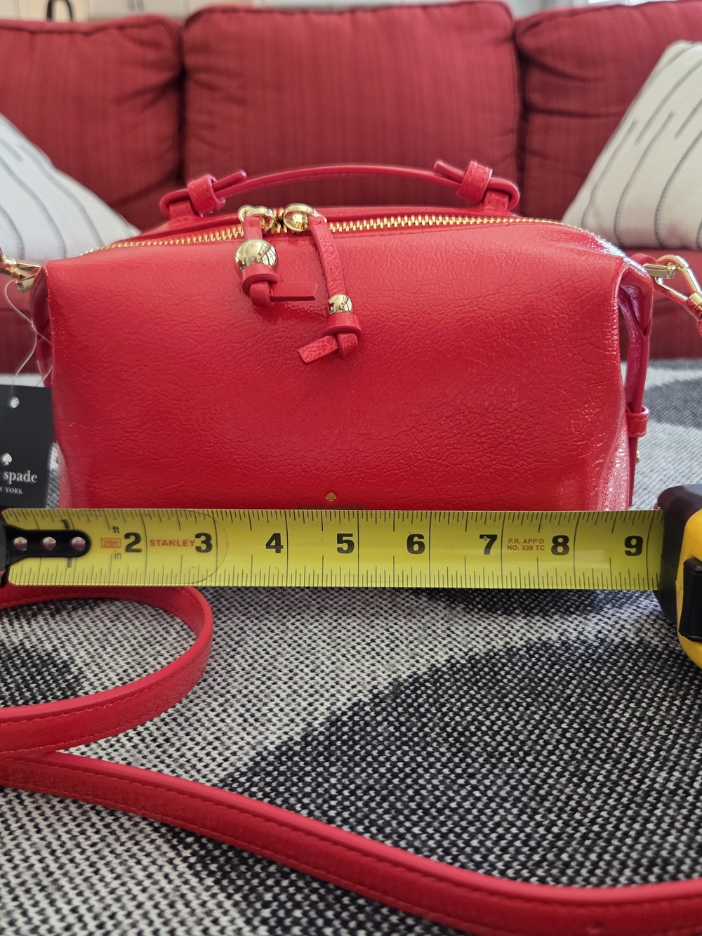 Kate Spade Shiny Red Leather Crossbody Bag with Gold Accent